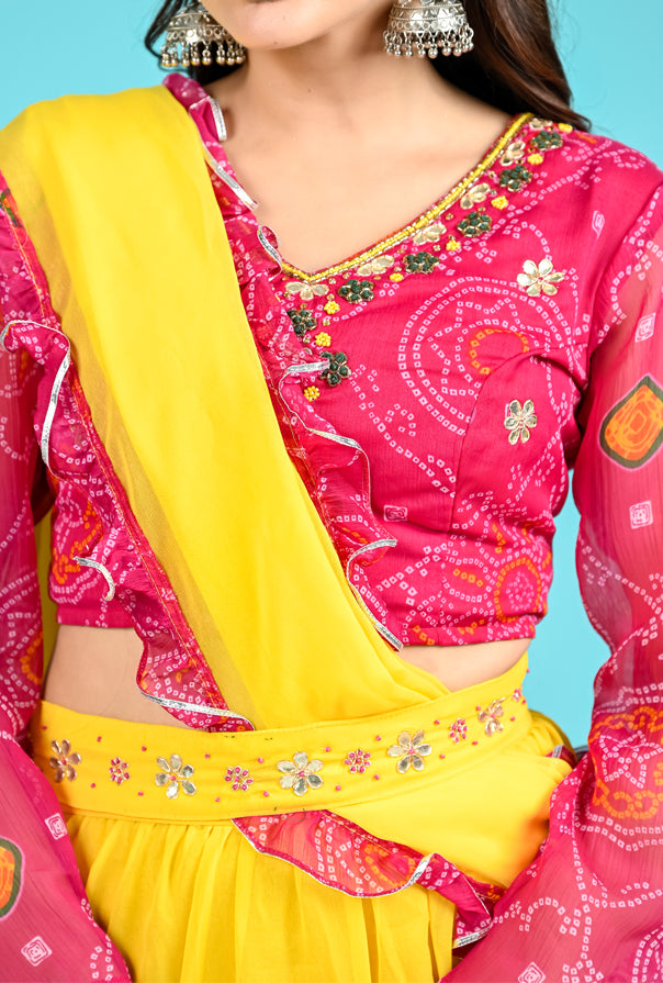 Yellow Skirt with attached Dupatta and Pink Bandhani Handwork Crop top Set